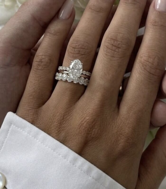 Triple diamond oval ring